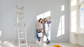 Young couple thinking about improvements they can make without violating their rental contract - Cheap renters insurance