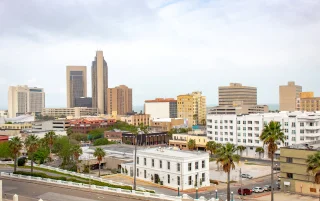 Downtown Corpus Christi skyline buildings along the Gulf Of Mexico – Corpus Christi, cheap car insurance in Texas