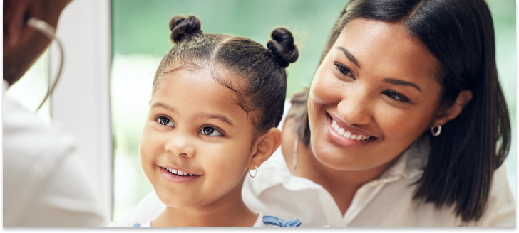 Mother, child and doctor with stethoscope for health care in a hospital for heart and lungs. Affordable health insurance through Covered Ca