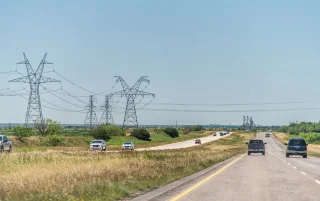 Highway road 84 near Snyder, Texas countryside with cars in traffic and power lines cables – Snyder, cheap car insurance in Texas