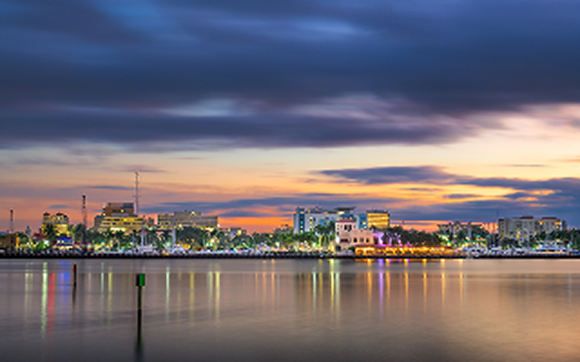 Bradenton, Florida, USA downtown cityscape on the Manatee River at dusk – Bradenton, cheap car insurance in Bradenton