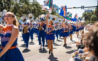 Gainesville, Florida - October 18, 2024: University of Florida Homecoming Parade, marching band on 13th street – Gainesville, cheap car insurance in Florida