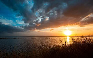 Epic beautiful sunset over Lake Monroe waters in a spring day in Deltona Florida – Deltona, cheap car insurance in Deltona