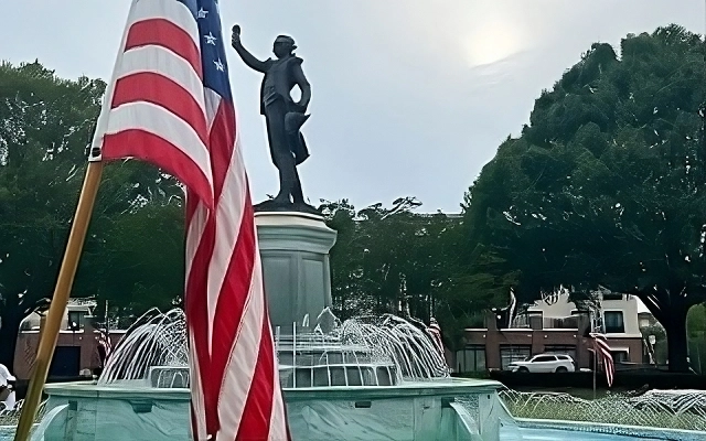 Lafayette Fountain, historic downtown LaGrange scenery, with US flag on Independence Day – LaGrange, cheap car insurance in Georgia