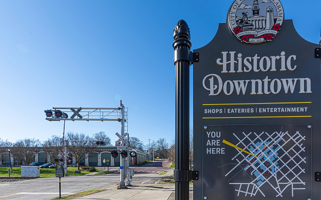 Sign for Historic Downtown Opelika on Railroad Street – Opelika, cheap car insurance in Alabama